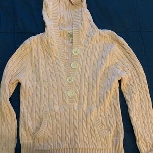 Light pink cable knit hooded sweater.